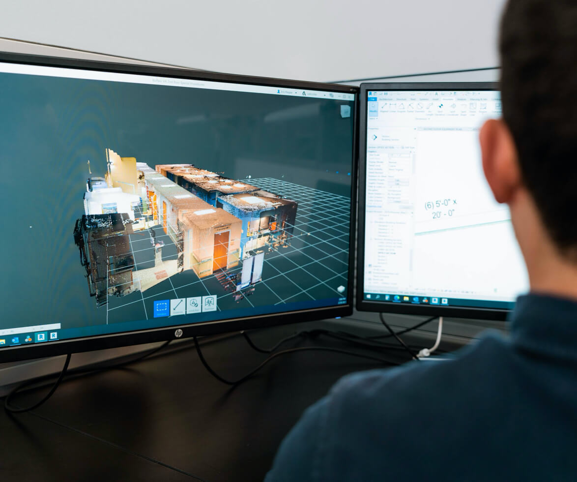 Acela employee working on a rendering